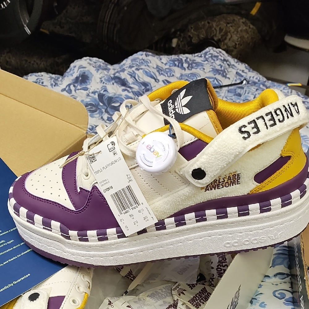 Adidas Purple and White Sneakers with Retro Modern Design
